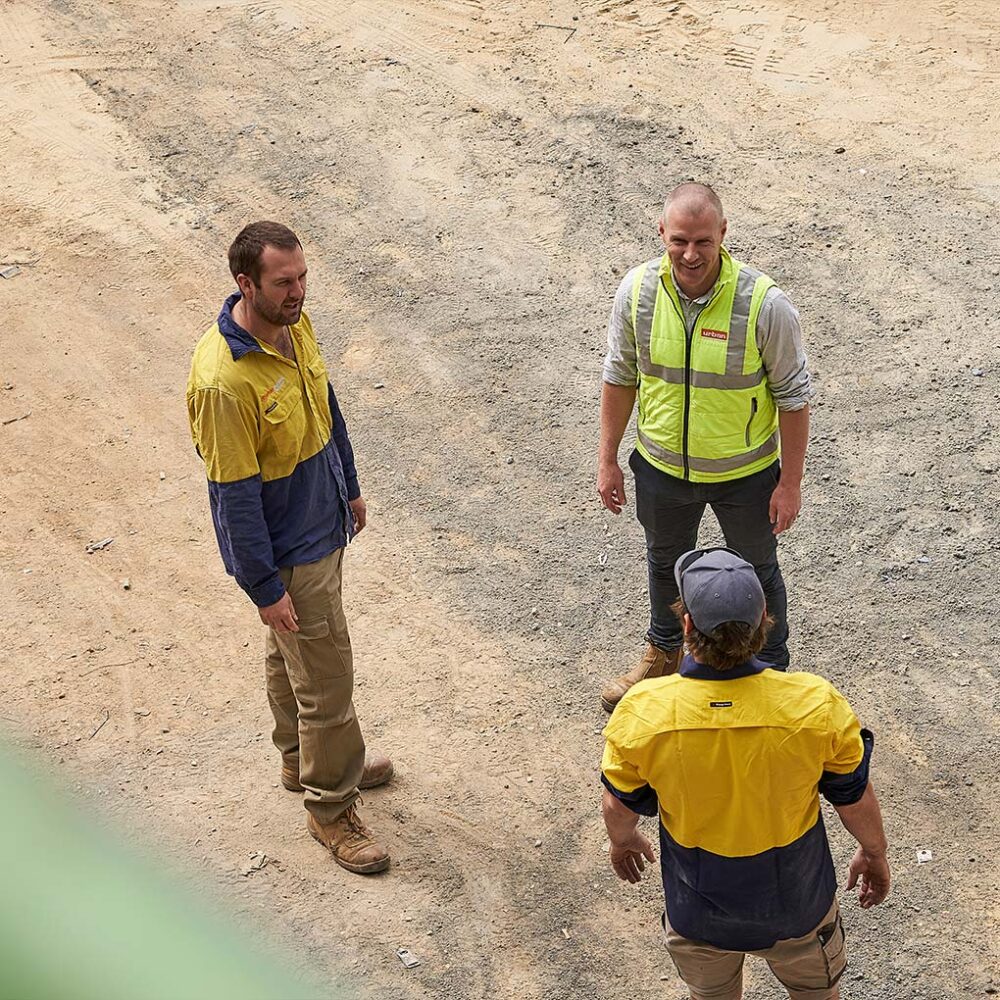 Urban Plumbing staff discussing a project in Adelaide
